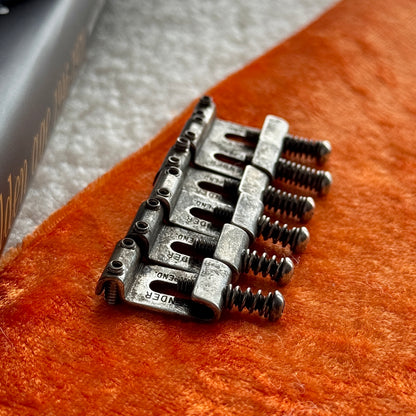 Genuine Fender® • Pat Pend Strat® Saddles